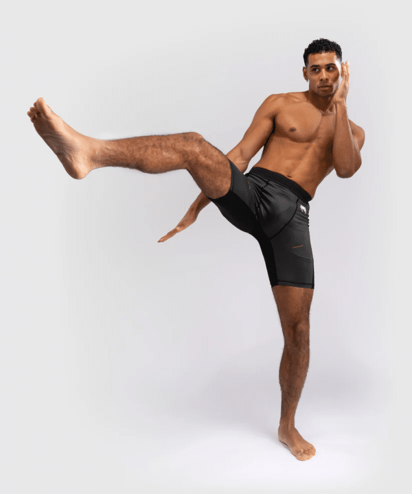 f5ac7a8c45fc83dd08fd0b82c8e1ef66a59eebba_VENUM_05365_052_38 Venum Tech. 3.0 ValeTudo Shorts - Image 2